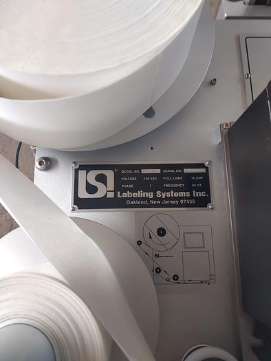 Used LSI Model 20-64  with Zebra Print bar code labeler