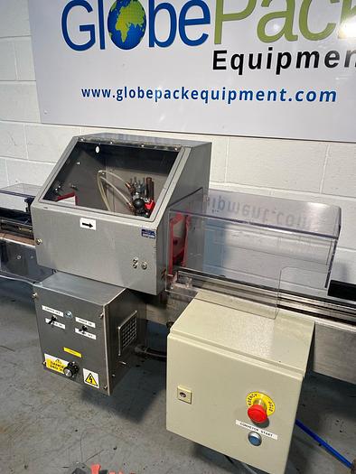 Used Sold Push on Capper with Conveyor at GlobePack Equipment