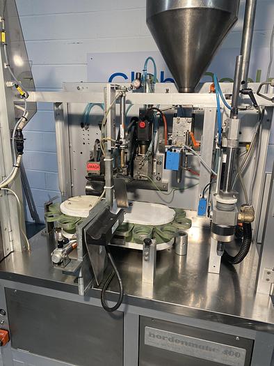 Used Norden NM400-HA Plastic Tube Filler