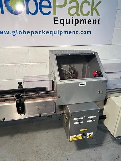 Used Sold Push on Capper with Conveyor at GlobePack Equipment