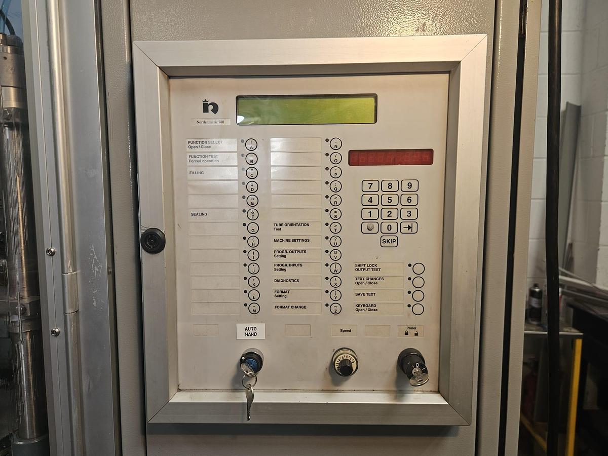 Used Norden NM700-HA Plastic & Laminate Tube Filler