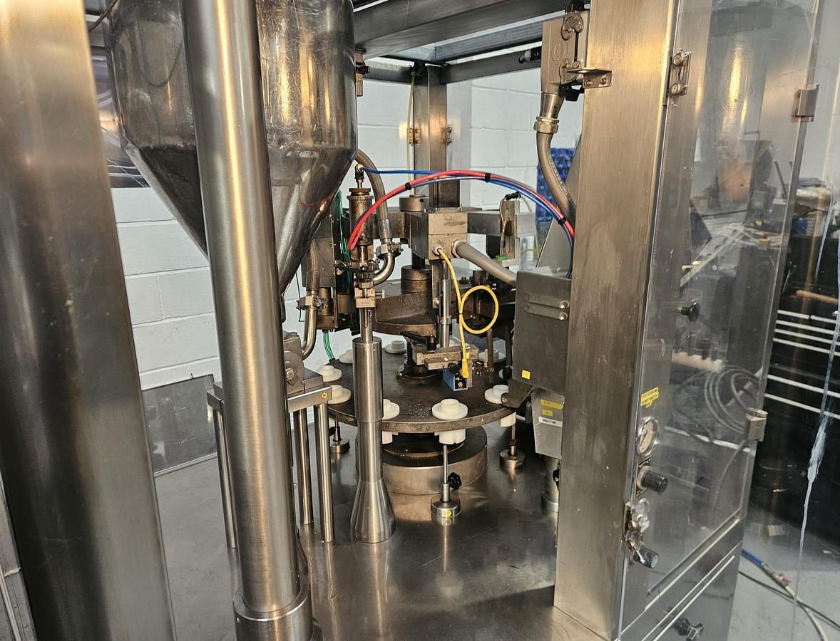 Used Comadis C1090 Plastic & Laminate Tube Filler