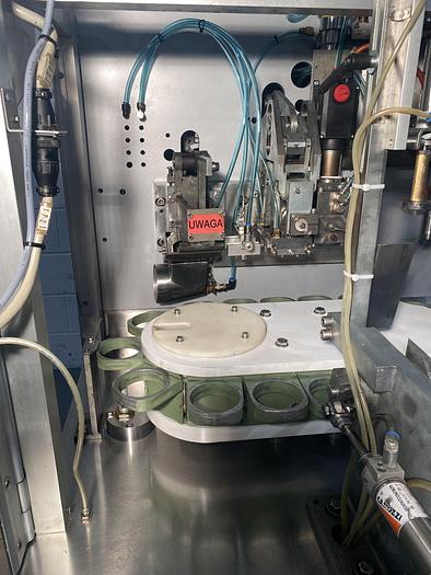 Used Norden NM400-HA Plastic Tube Filler