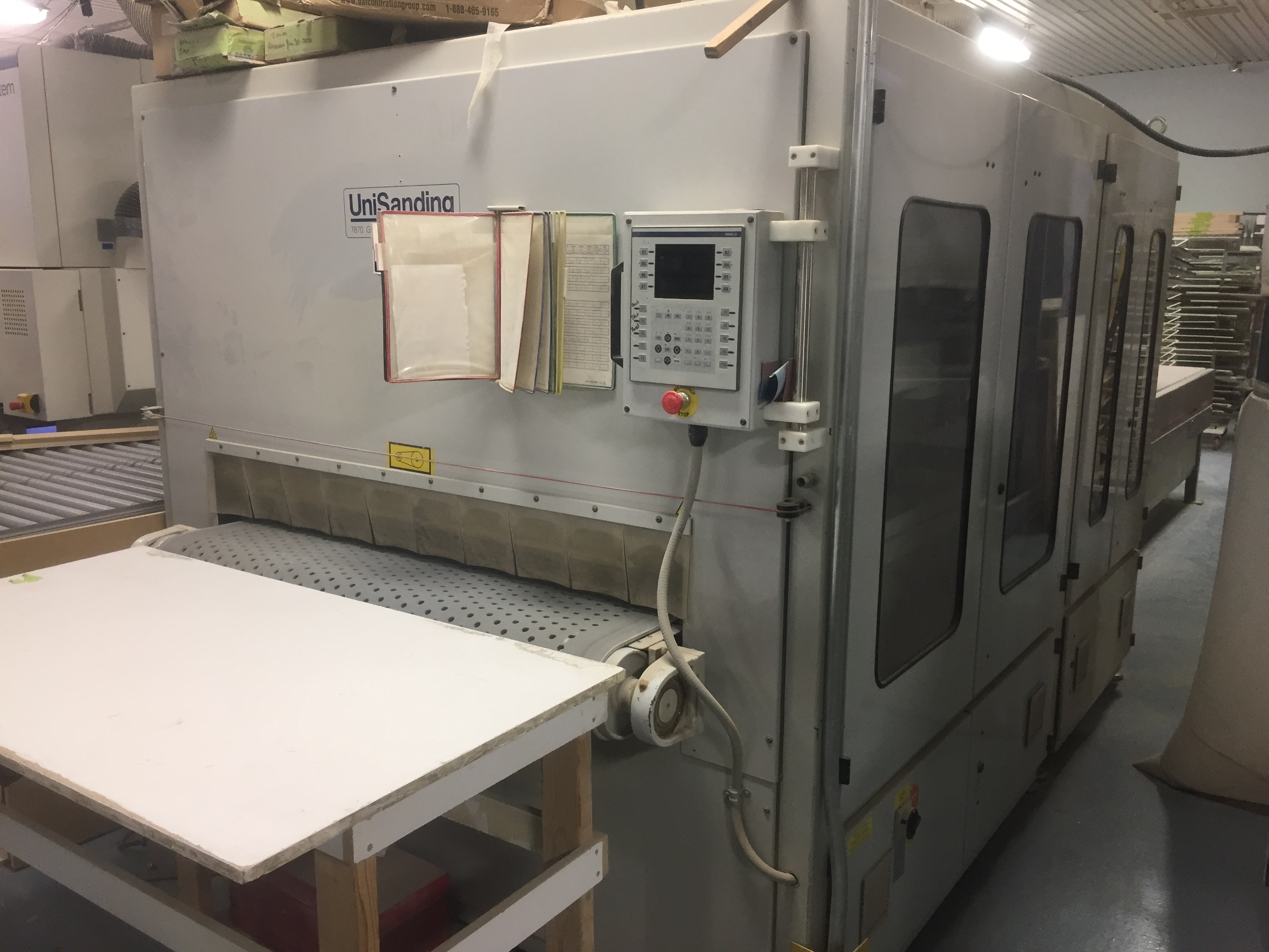 Used 2004 Unisanding Cross Sander 2.4.0 k.v. Top sandermodel #1109 and Doucet return conveyor