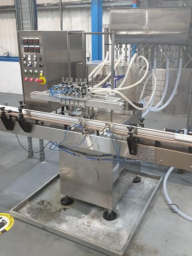 Used King 6 head liquid filler