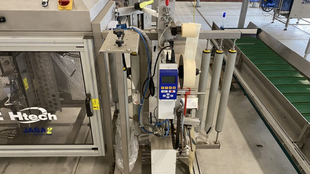 Used Newtec Htech weighing and bagging line