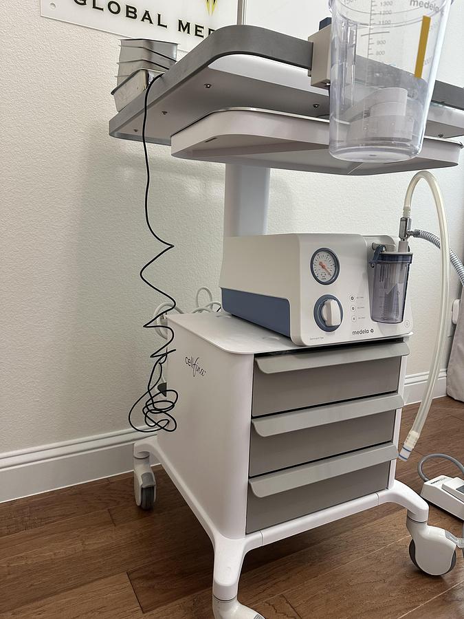 Used Merz Cellfina for Cellulite Reduction w/ Medela Dominant 50 suction machine