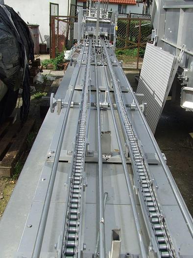 Used Linear packing machine "GRUNWALD" with automatic feeding of boxes and lids