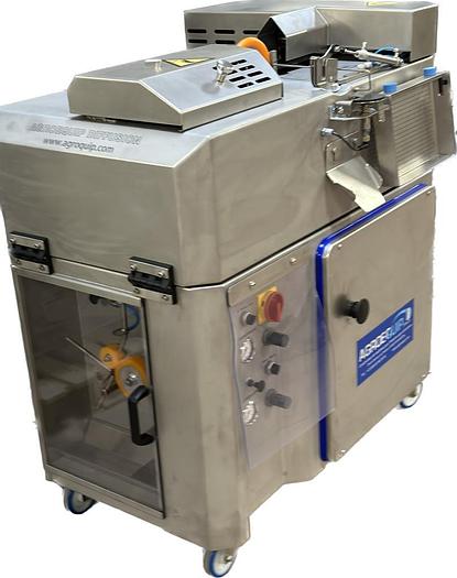 attacheuse à saucisson G1