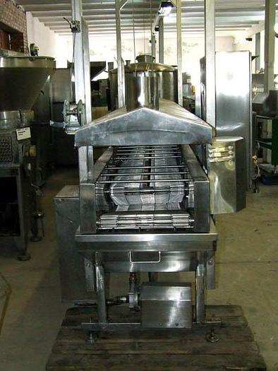 Used Electrically powered, belt, flow frying unit with a pressure belt