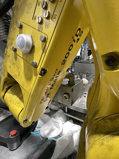 Used N95 FACE MASK NOSE CLIP FANUC ROBOTIC ASSEMBLE AND ATTACHING CELL BY ACE NEW 2020
