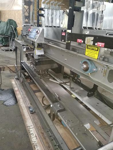 Used Hartness 825 case packer Stainless  825 8-761