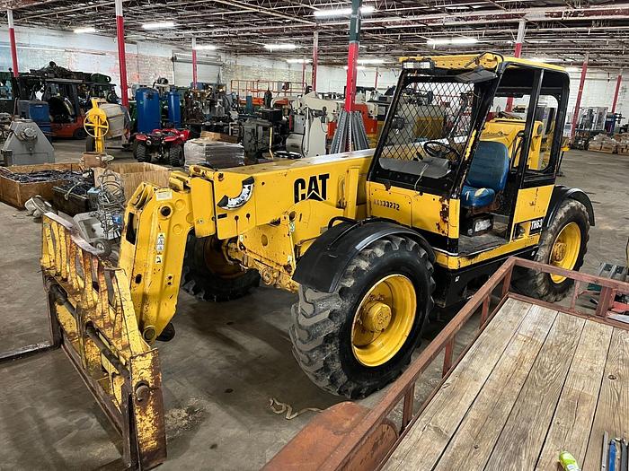 Used CATERPILLAR TELEHANDLER MODEL TH 63 W/ FORKS AND BUCKET