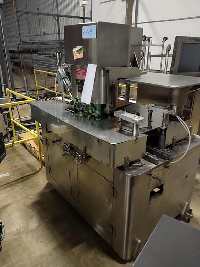 Used Resina U-30 Stainless steel base capper