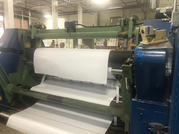 Used 72" WIDE REM CENTER SURFACE DUPLEX SLITTER REWINDER