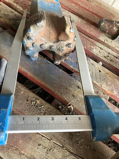 Used 5-3/4" x 9" Carbide Button Chisel Bit