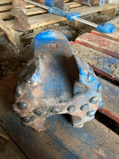 Used 5-3/4" x 9" Carbide Button Chisel Bit