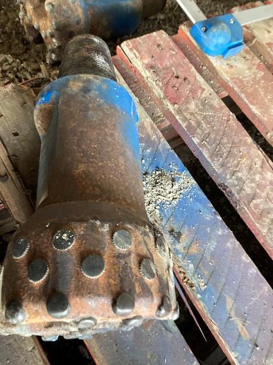 Used 5-3/4" x 9" Carbide Button Chisel Bit