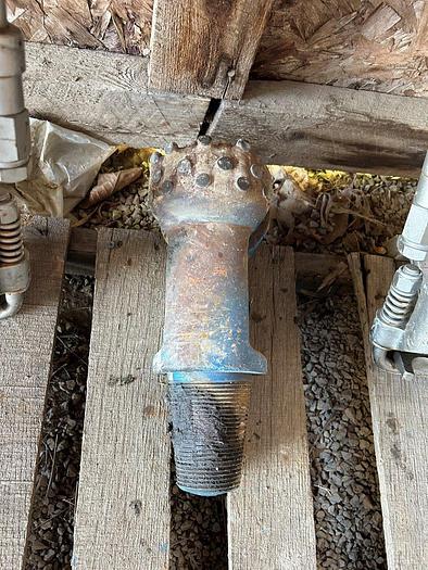 Used 5-3/4" Trident Supreme Flat Face Button Bit