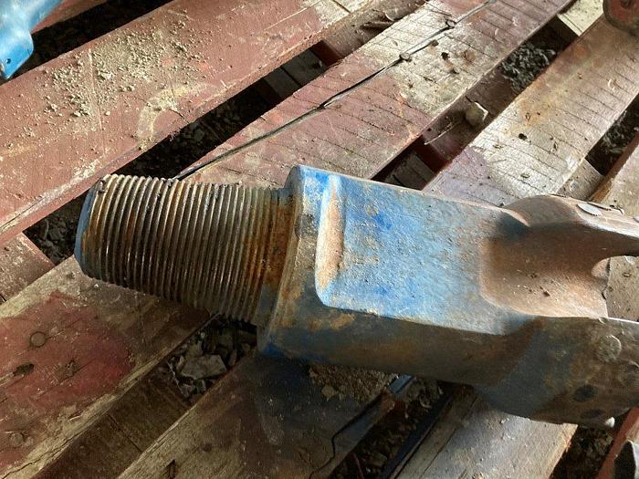 Used 5-3/4" x 9" Carbide Button Chisel Bit