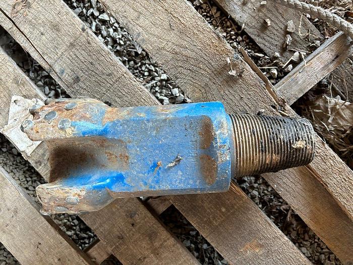 Used 5-3/4" Trident Supreme Flat Face Button Bit