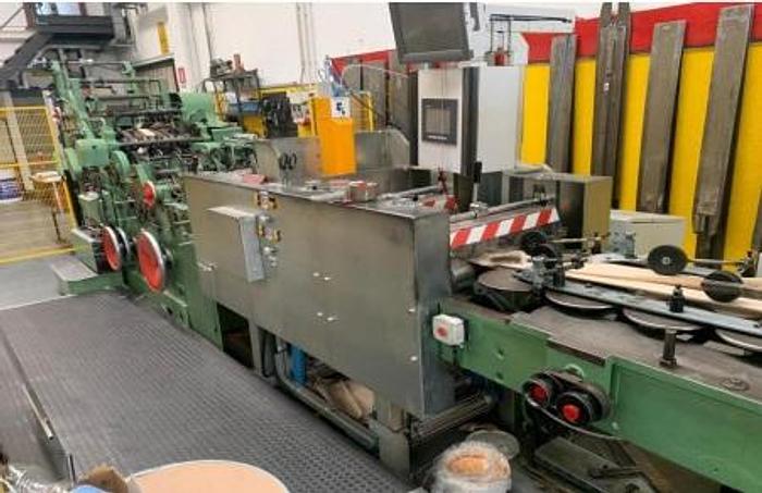 Used W&H TRIUMPH 3A with 2 col. in line flexo servo (+ system for TNT vacuum bags)