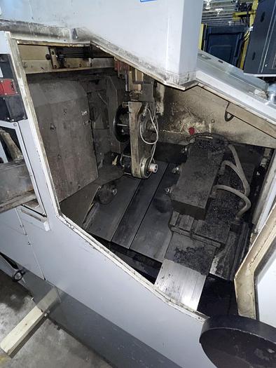 Used FUJI FS4-31 CNC GANG TOOL CNC LATHE WITH ROBOT LOADER