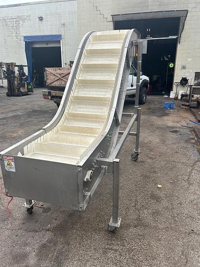 Used INCLINE CLEATED BELT CONVEYOR, STAINLESS STEEL, 24’’ WIDE X 120’’ LONG