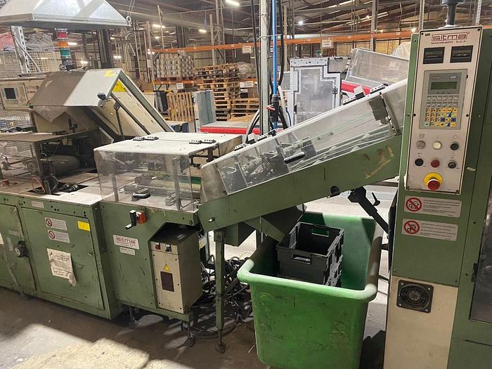 Used 2002 Sitma C905 Polyrap Inserter