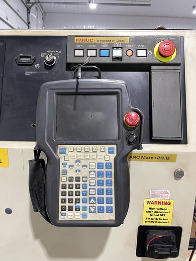 Used FANUC FANUC ARC MATE 120iB MIG WELDING CELL WITH LINCOLN 455M AND INDEX TABLE 5' X 8' RJ3iB CONTROL