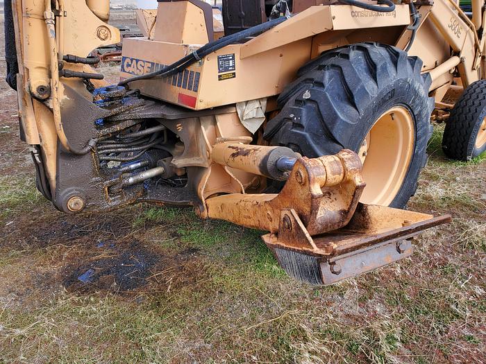 Used Case 580SE Backhoe w/ Attachments