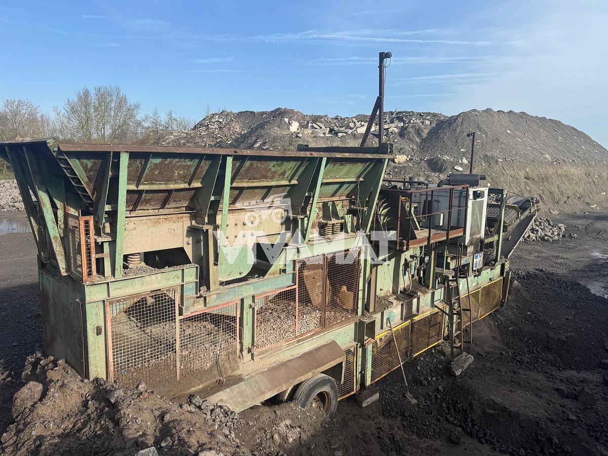D'occasion JAW CRUSHER Brown Lenox Kue-Ken 114 SL9,44 tons on wheels, CE, year 1995, still running, POR