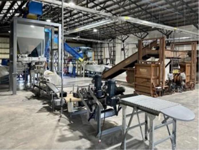 Used COMPLETE LOOSE BAGGING SYSTEM