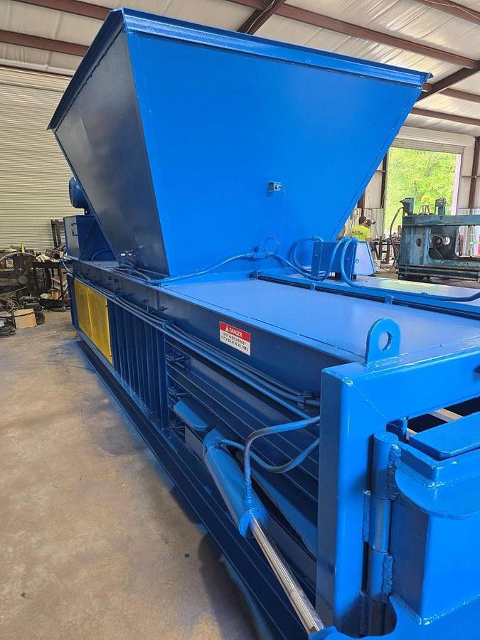 Used Reconditioned  Selco / Harris Closed Door Baler