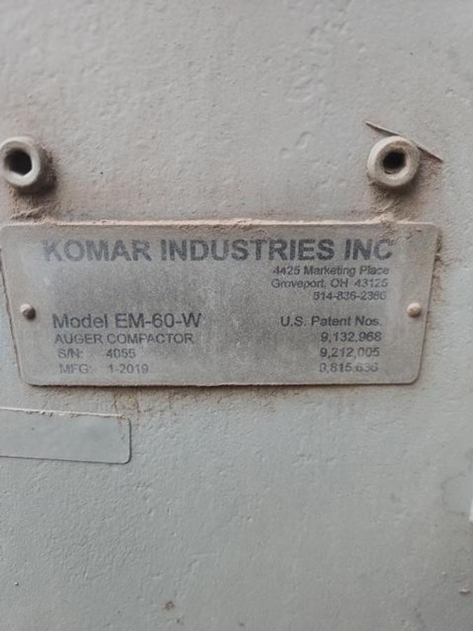 Used Komar Auger-Pak Compactor