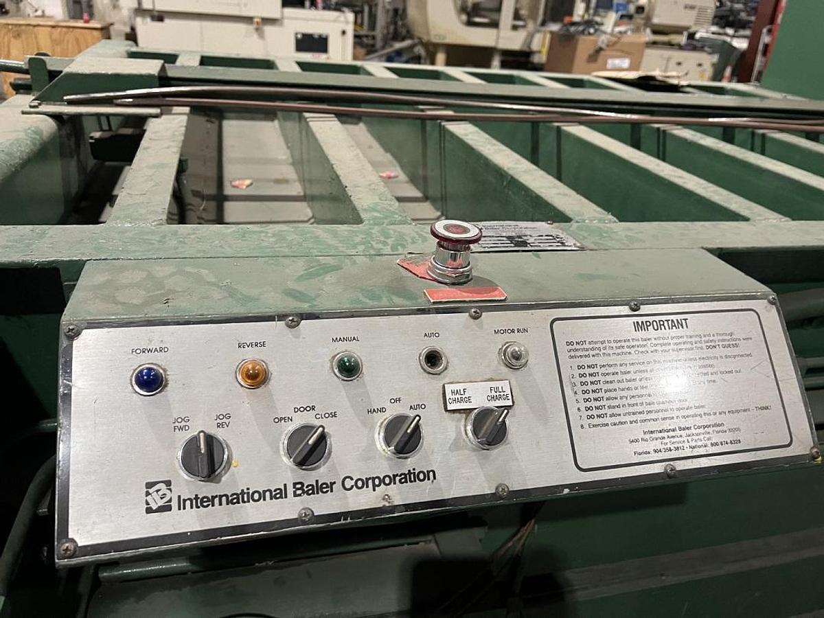 Used International Wide Mouth Closed Door Baler