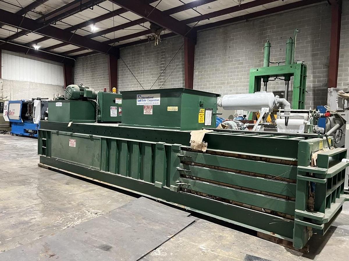 Used International Wide Mouth Closed Door Baler
