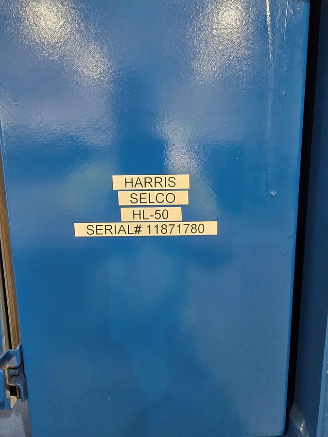 Used Reconditioned  Selco / Harris Closed Door Baler