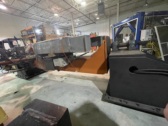 Used FANUC ARCMATE 120iC/10L MIG WELDING CELL WITH 2 AXIS 10' LONG DROP CENTER TRUNNION W/ROTARY CNC TABLE