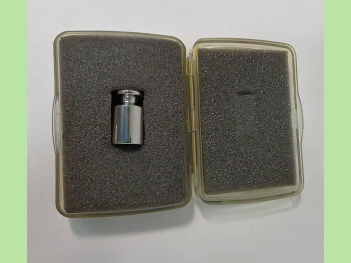 Used Fisherbrand 50g weight.