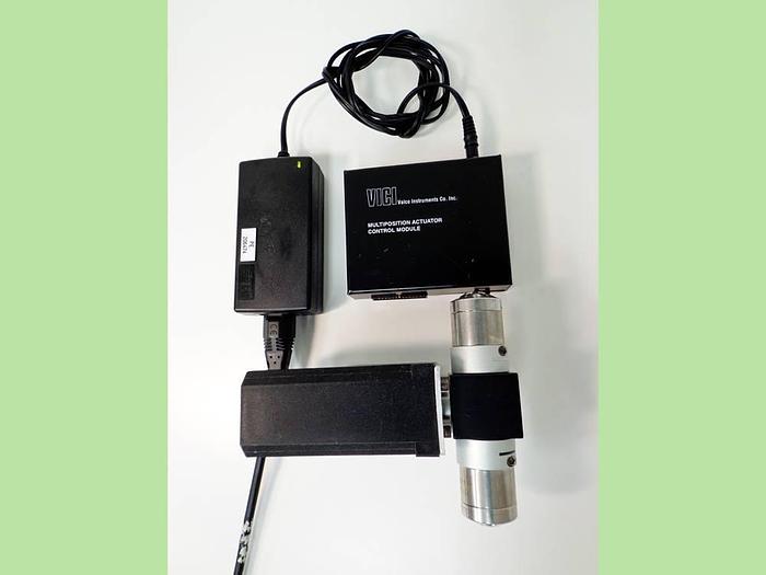 Used Vici Valco Instruments Modular Universal Valve/Actuator, Model EMTMA-CE, with EMHCA-CE Multiposition Actuator Control Module.