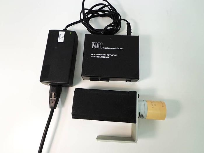Used Vici Valco Instruments Modular Universal Valve/Actuator, Model EMHMA-CE, with EMTCA-CE Multiposition Actuator Control Module.