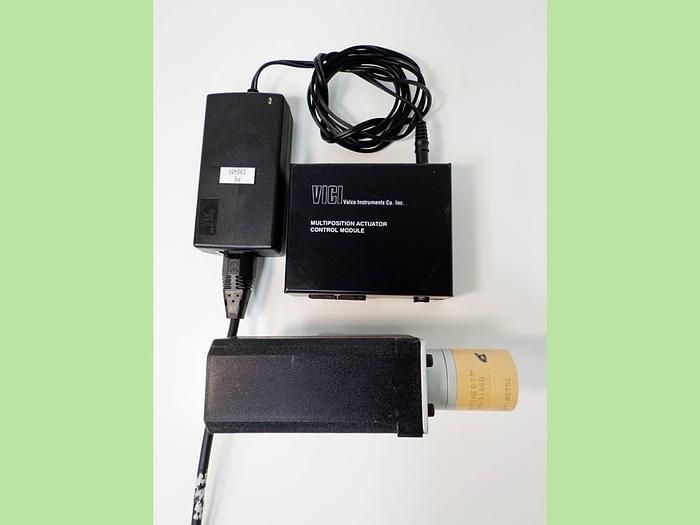 Used Vici Valco Instruments Modular Universal Valve/Actuator, Model EMHMA-CE, with EMTCA-CE Multiposition Actuator Control Module.