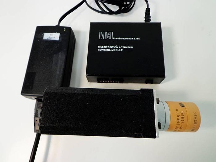 Used Vici Valco Instruments Modular Universal Valve/Actuator, Model EMHMA-CE, with EMTCA-CE Multiposition Actuator Control Module.