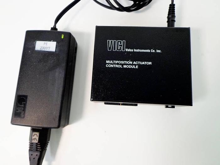 Used Vici Valco Instruments Modular Universal Valve/Actuator, Model EMHMA-CE, with EMTCA-CE Multiposition Actuator Control Module.