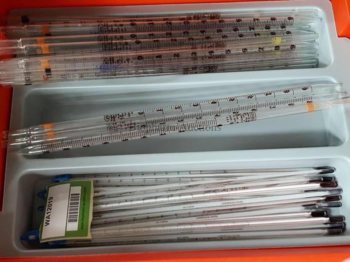 Used Glass thermometers and glass measuring tubes