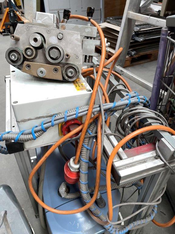 Used Herzog & Heymann mobile vacuum opening station with servo drive and Becker DSK 440 vacuum generator