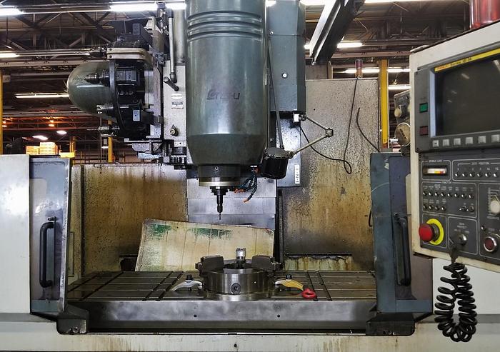 Used 1992 Enshu Vertical Machining Center, Model 650VX, 26" X 79" Table, X-63", Y-26" 50 Taper, 20 HP, 6000 RPM, Fanuc 15M CNC