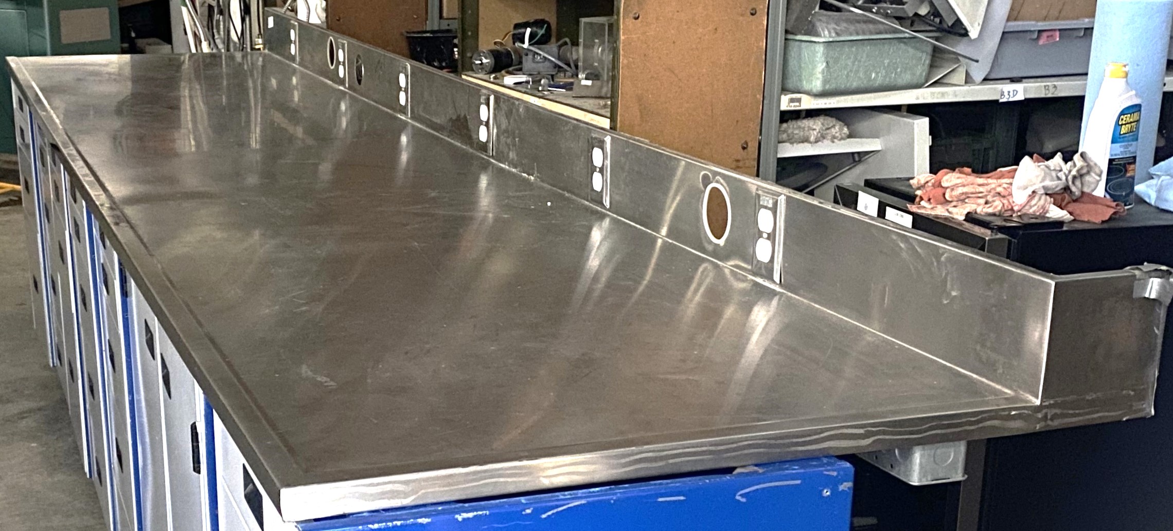 Used Stainless Steel Dished Worksurface with Electrical Outlets and Backsplash (12-ft)
