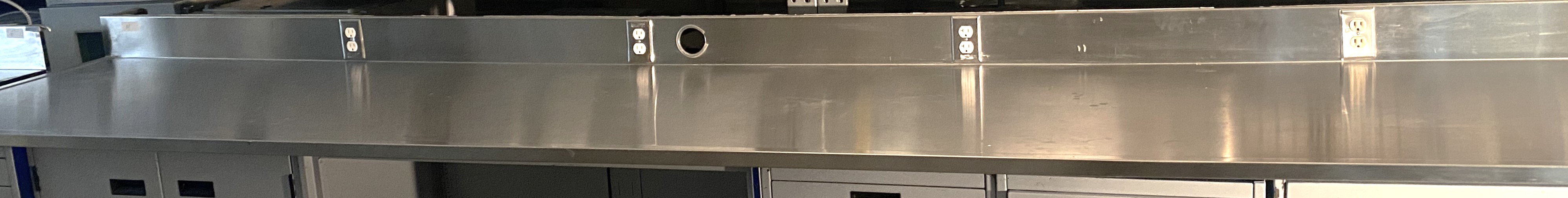 Used Stainless Steel Dished Worksurface with Electrical Outlets and Backsplash (14-ft)